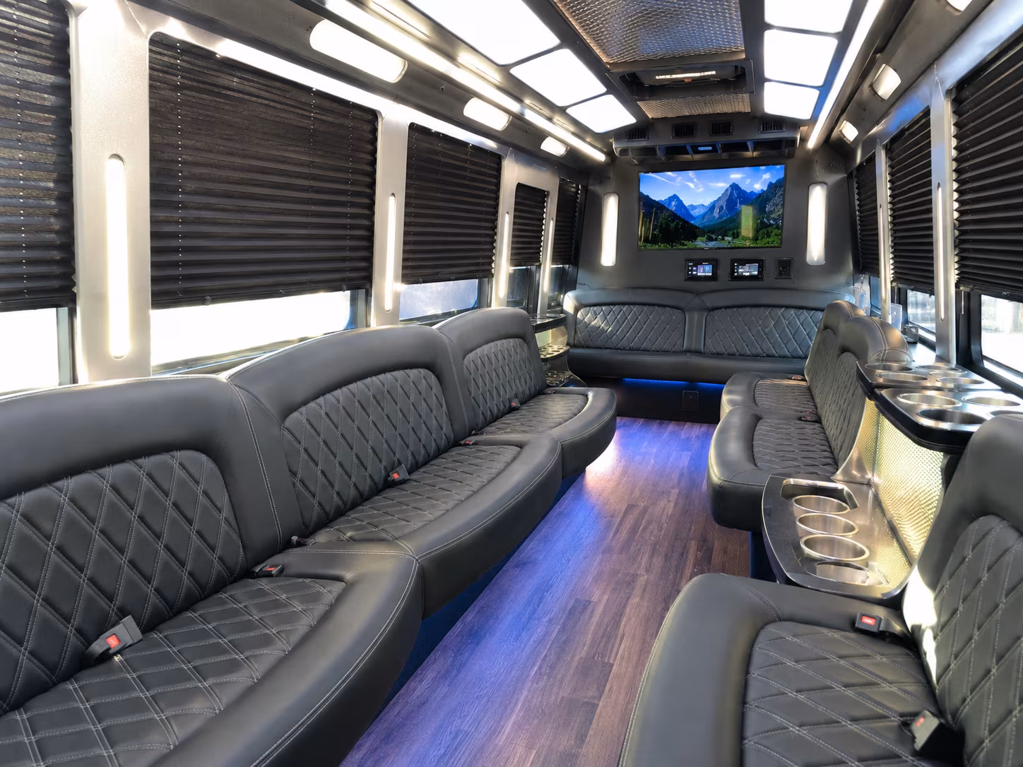 Wedding guests seated inside a party bus serving Everett